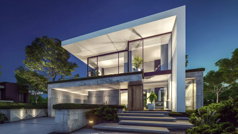 Modern two-story house with large windows and sleek design, lit at night.